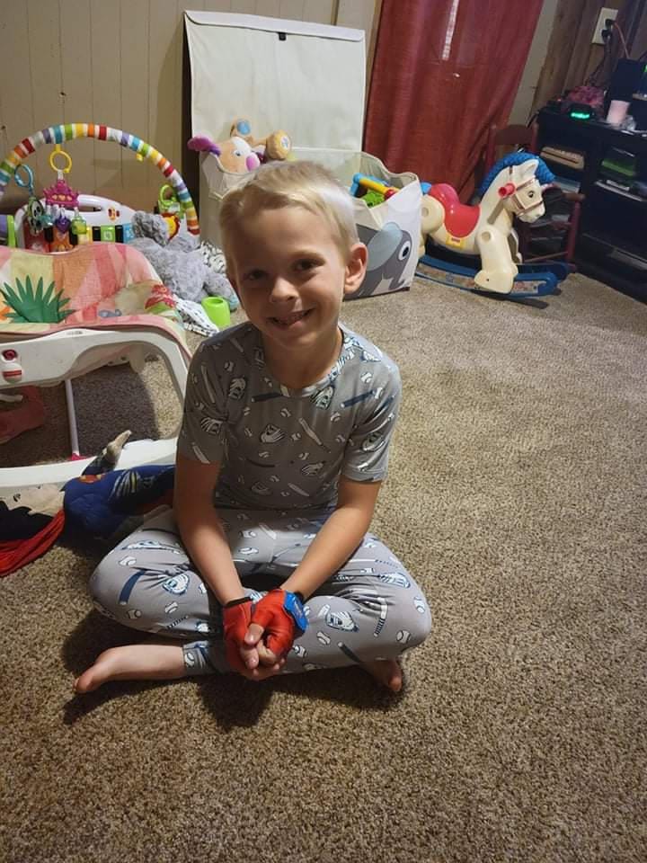 Customer photo: boy sitting in pajamas