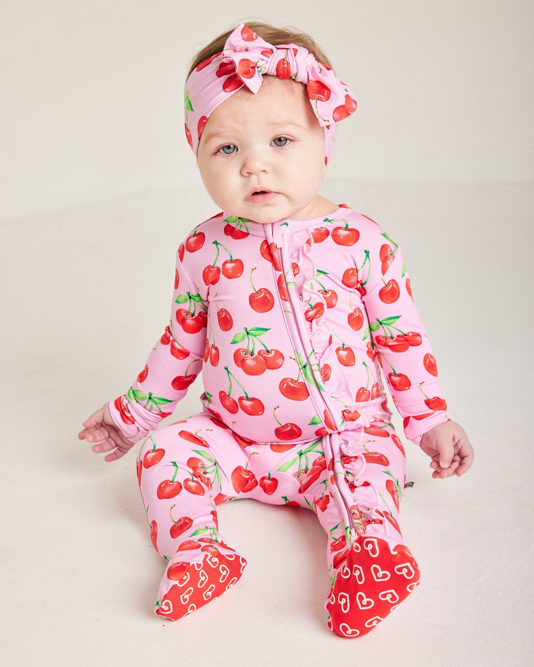 Cherry Ruffled Zippered Footie by Lev Baby