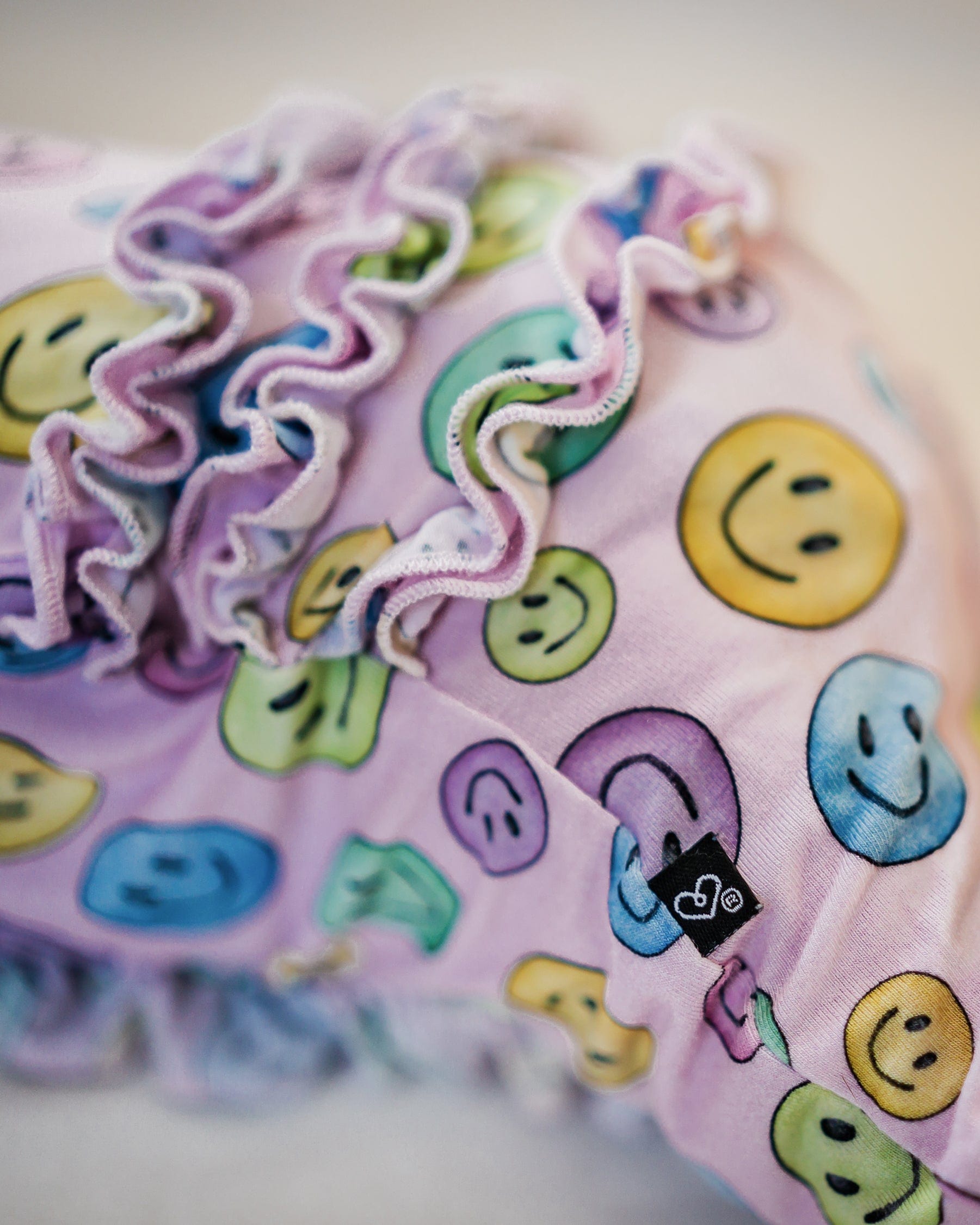 Smiley Ruffled Zippered Footie