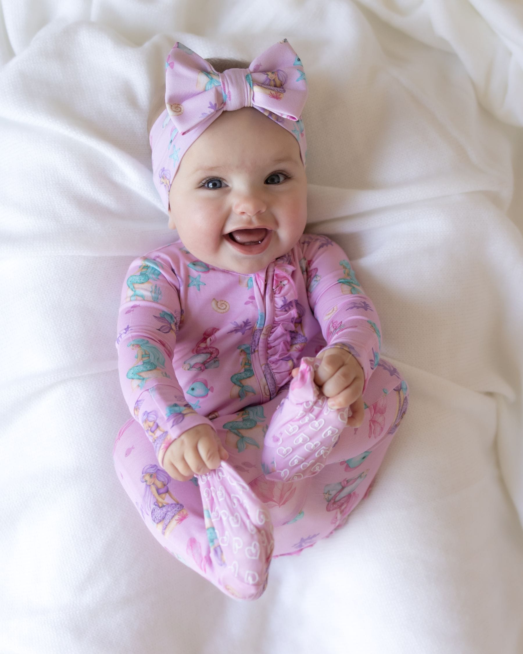 Ariella Ruffled Zippered Footie