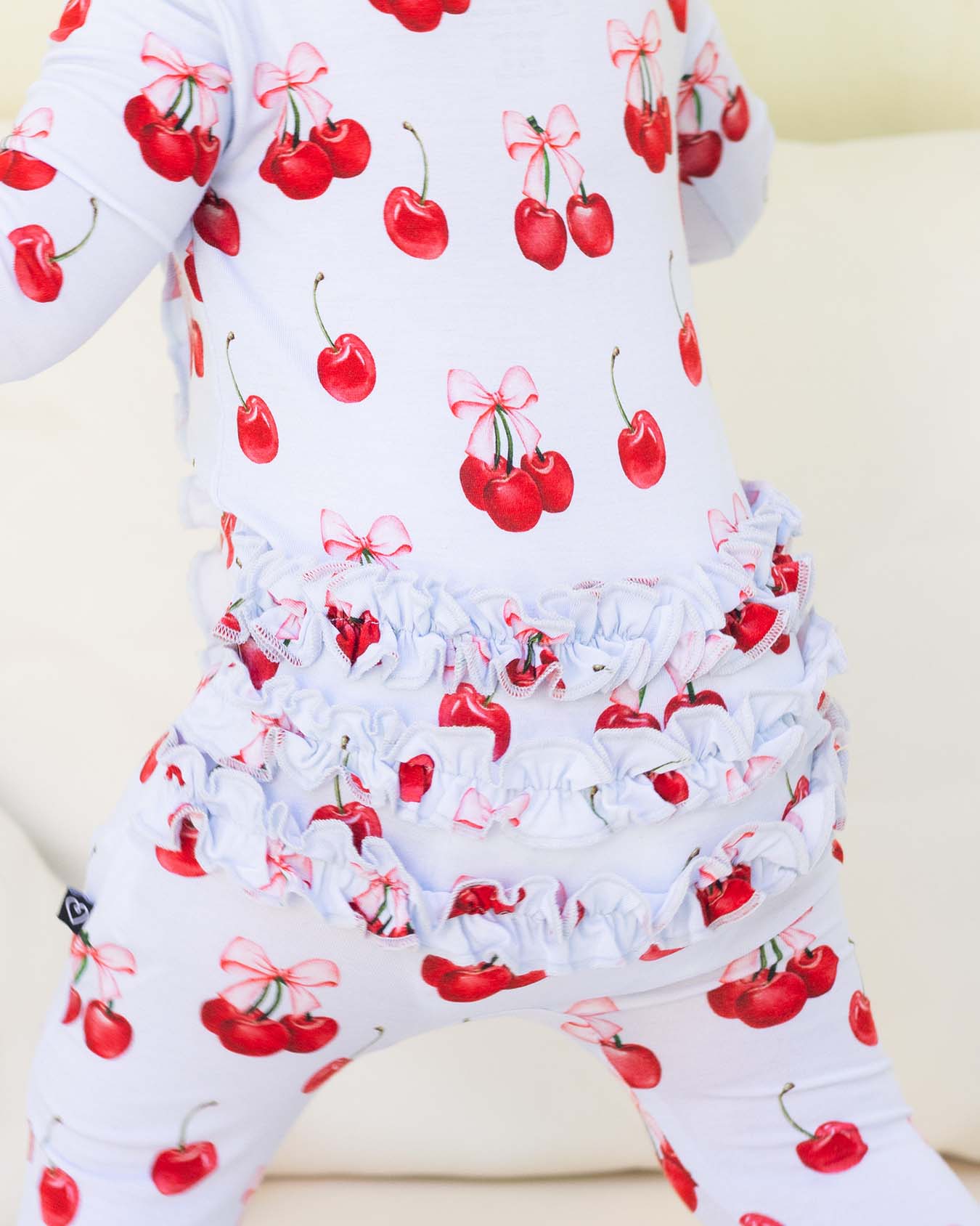 Alice Ruffled Zippered Footie