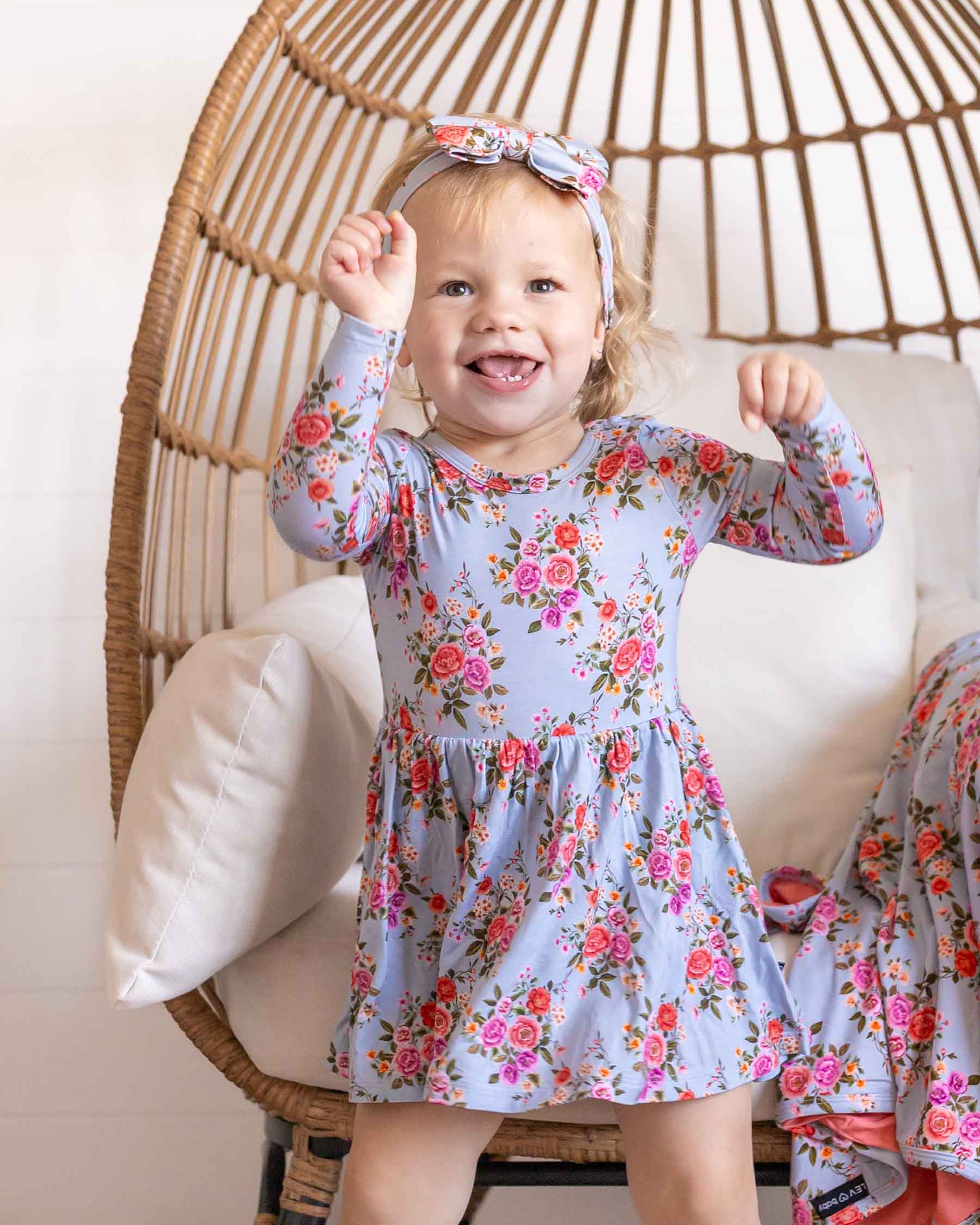 Quinn L/S Flutter Skirted Bodysuit