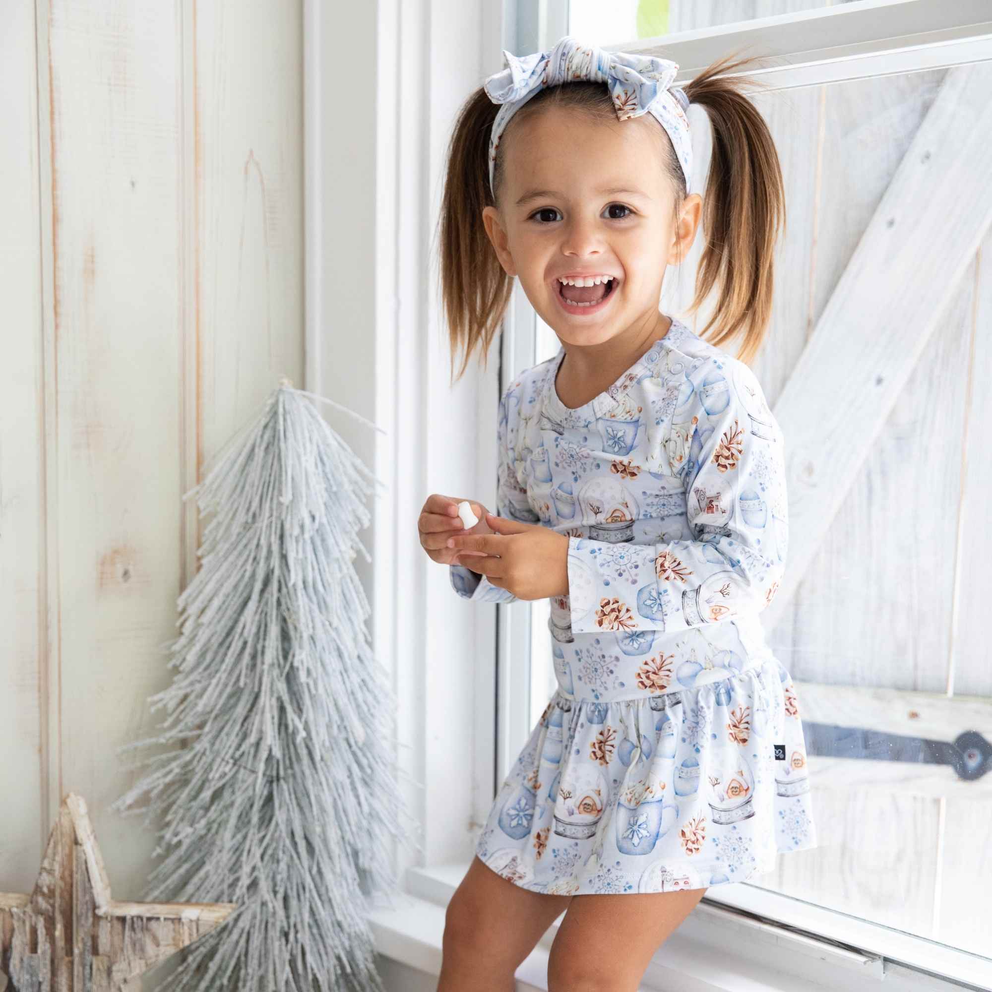 Aspen Skirted Bodysuit